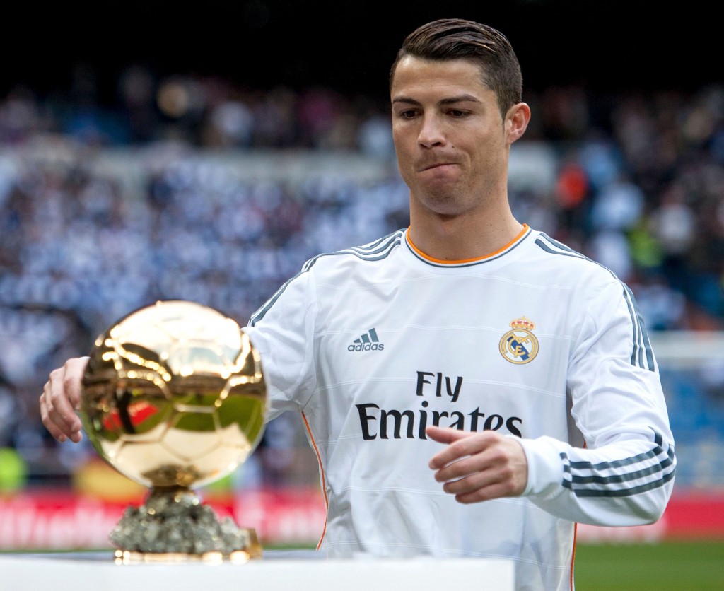 Cristiano Ronaldo holds his FIFA Ballon D'Or trophy before the Spanish league football match between Real Madrid and FC Granada at the Santiago Bernabeu Stadium Featuring: Cristiano Ronaldo Where: Madrid, Spain When: 25 Jan 2014 Credit: SIPA/WENN.com **Only available for publication in Germany. Not available for publication in the rest of the world.**