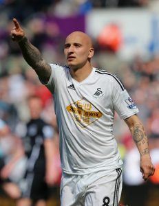 SWANSEA, WALES - APRIL 11: Jonjo Shelvey of Swansea City celebrates scoring the equaliser during the Barclays Premier League match between Swansea City and Everton at Liberty Stadium on April 11, 2015 in Swansea, Wales. (Photo by Jan Kruger/Getty Images)