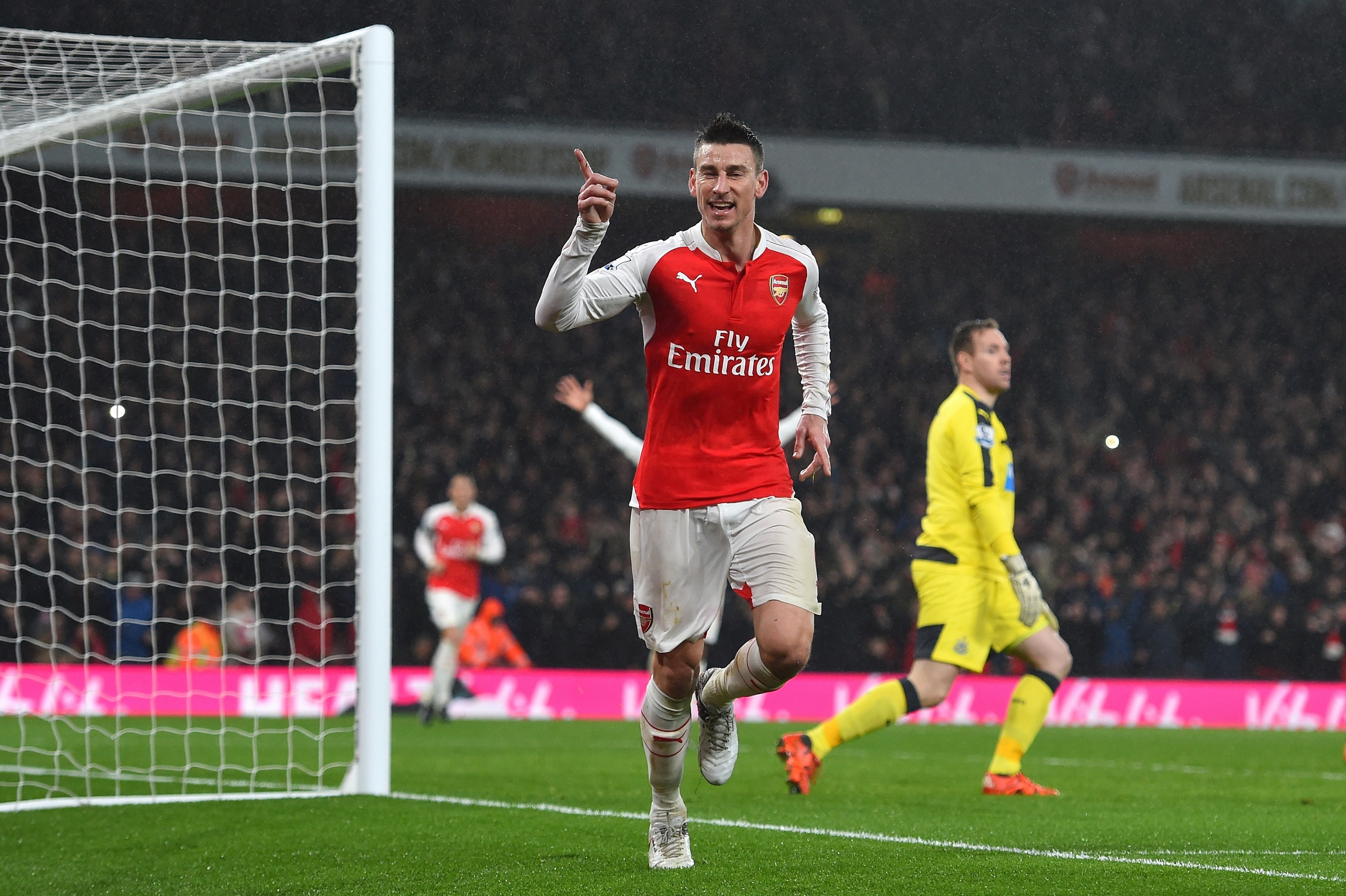 LONDON, ENGLAND - JANUARY 02: Laurent Koscielny of Arsenal celebrates scoring his team's first goal during the Barclays Premier League match between Arsenal and Newcastle United at Emirates Stadium on January 2, 2016 in London, England. (Photo by Shaun Botterill/Getty Images)