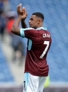 GLASGOW, SCOTLAND - JULY 30: Andre Gray applauds the traveling Burnley fans during a pre-season friendly between Rangers FC and Burnley FC at Ibrox Stadium on July 30, 2016 in Glasgow, Scotland. (Photo by Mark Runnacles/Getty Images)